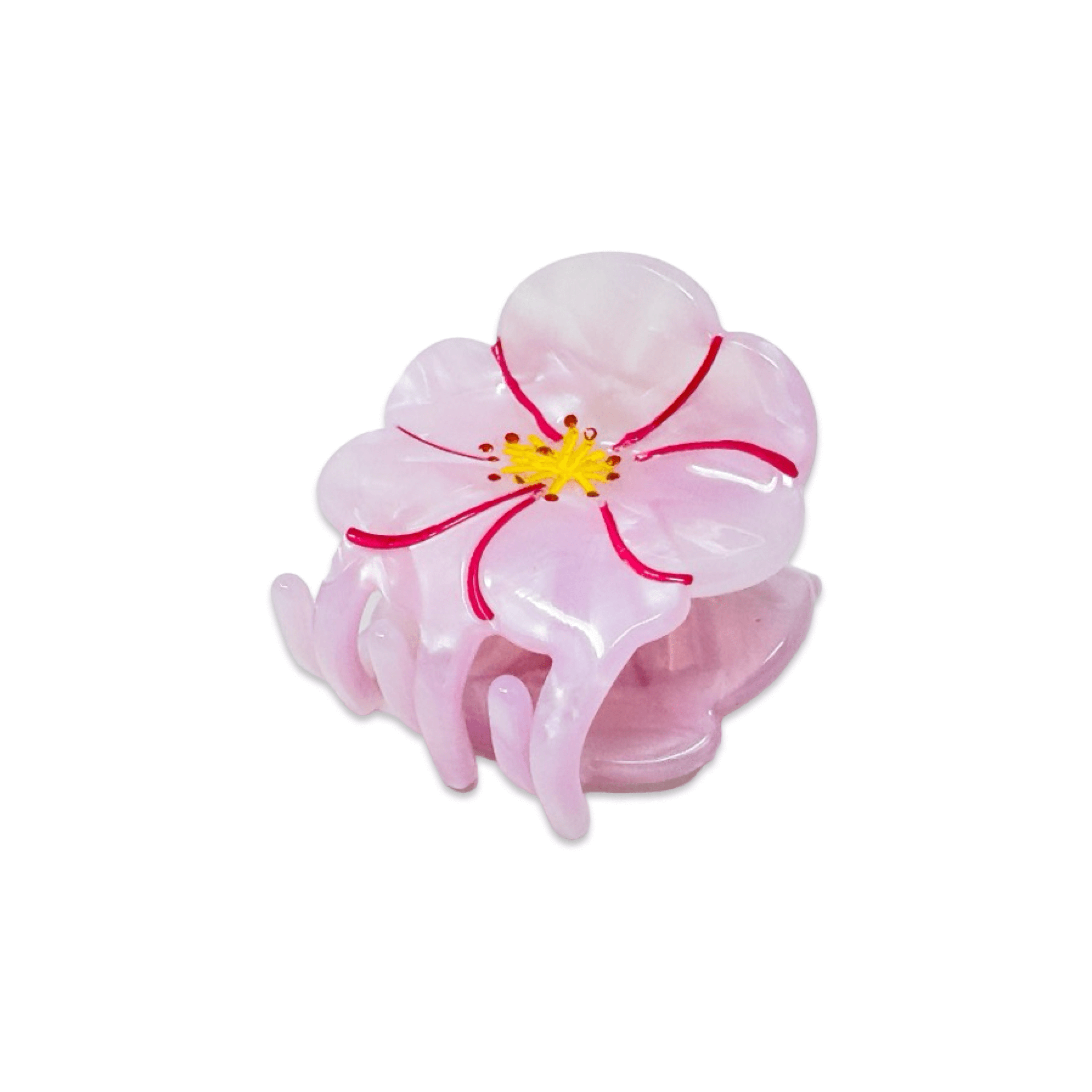 Pink flower-shaped hair clip on a white background