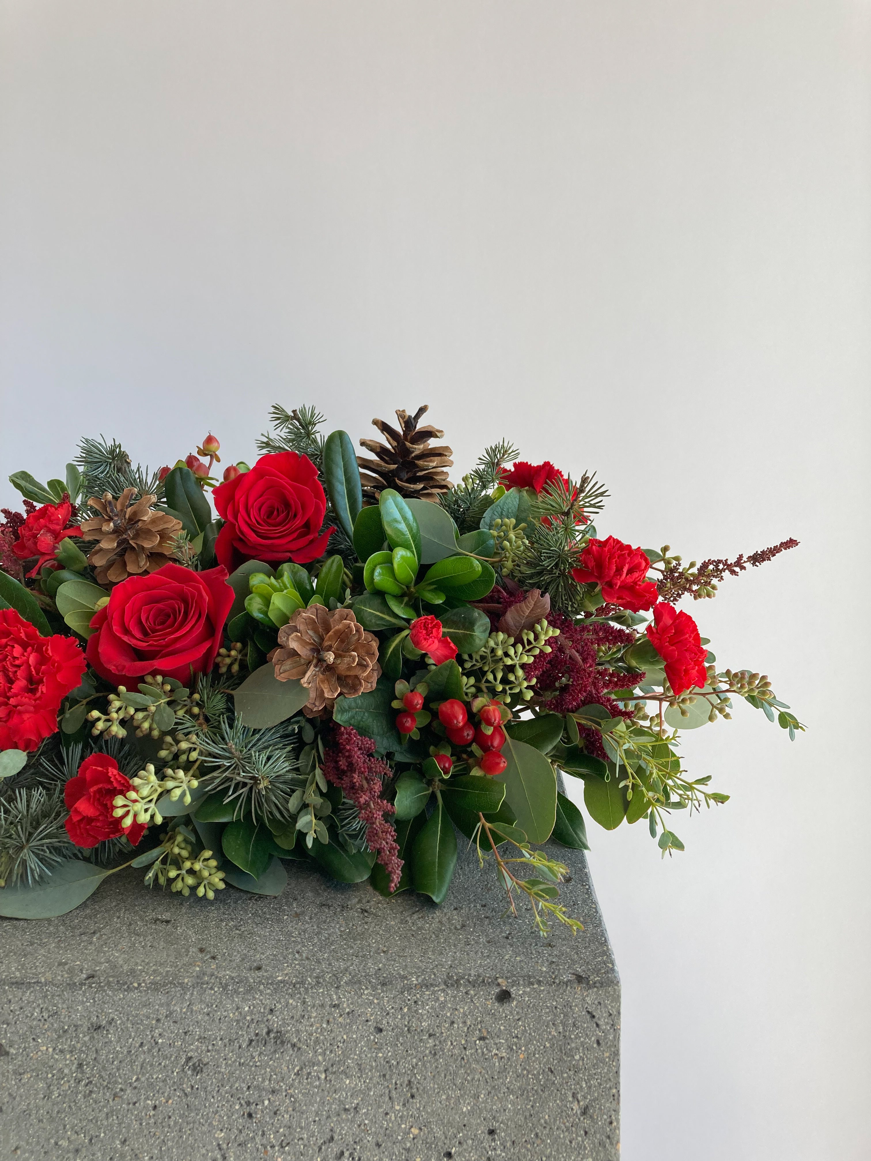 Home For The Holidays Centerpiece | Winter Seasonal Florist Design in Red Tones + Christmas Greens