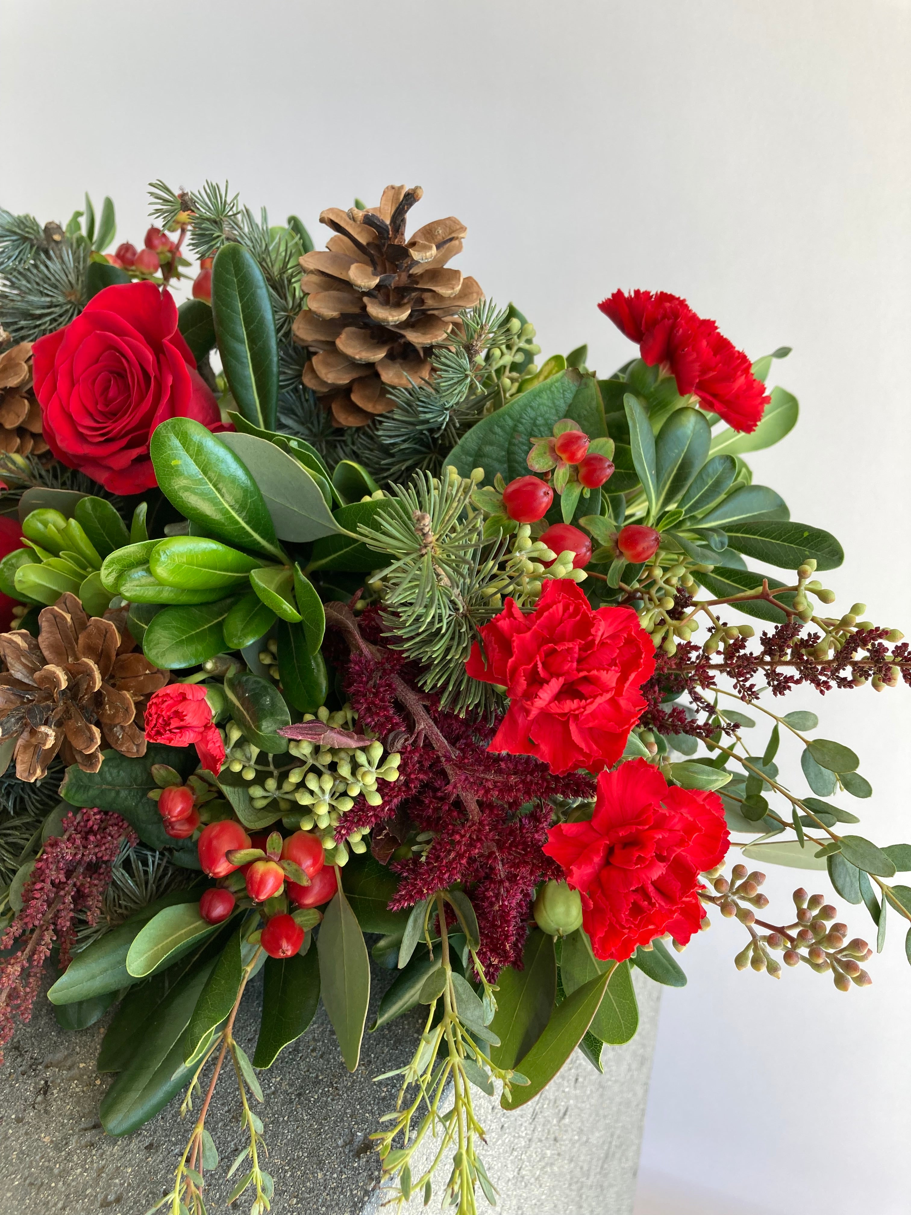 Home For The Holidays Centerpiece | Winter Seasonal Florist Design in Red Tones + Christmas Greens