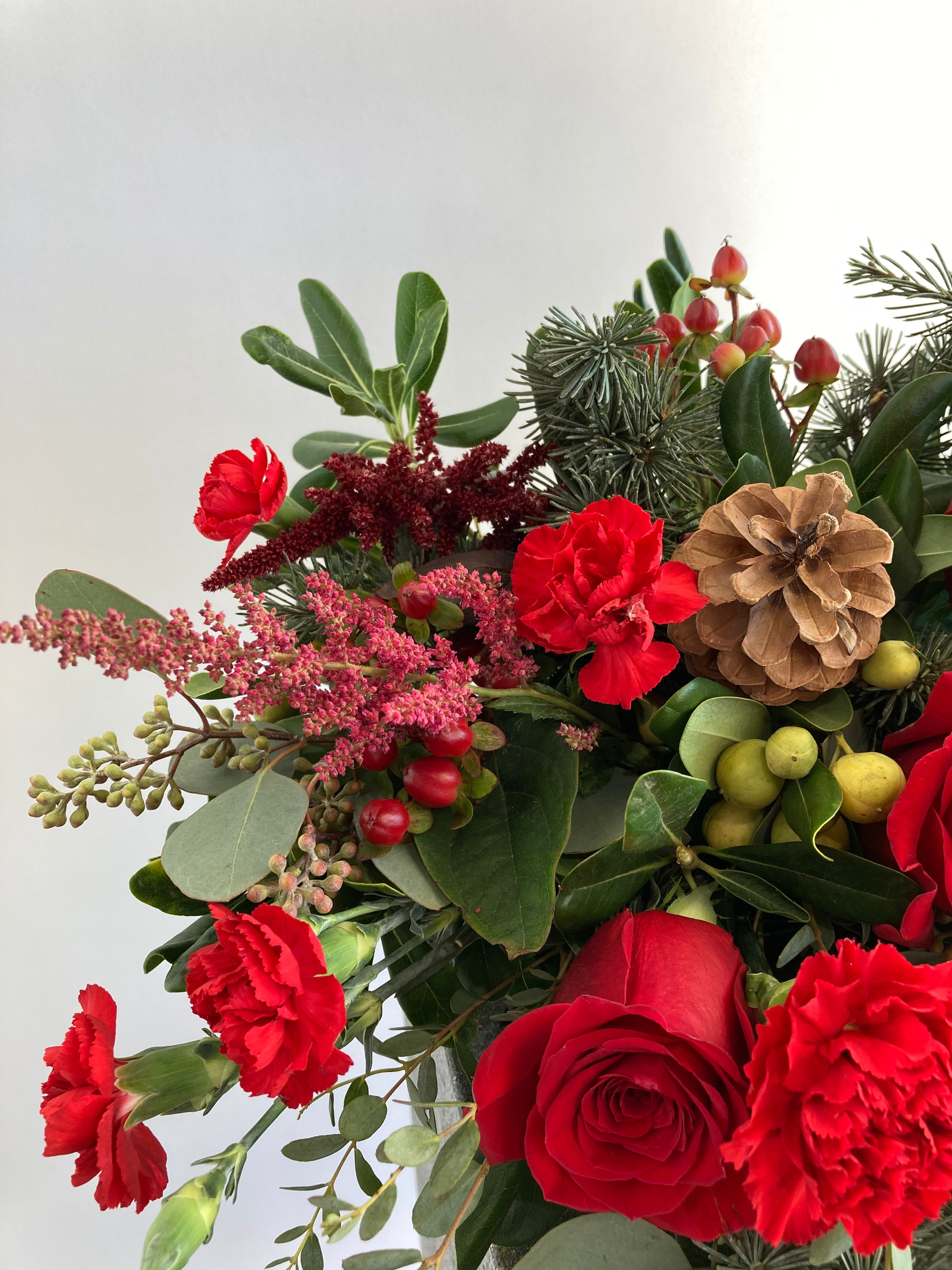 Home For The Holidays Centerpiece | Winter Seasonal Florist Design in Red Tones + Christmas Greens