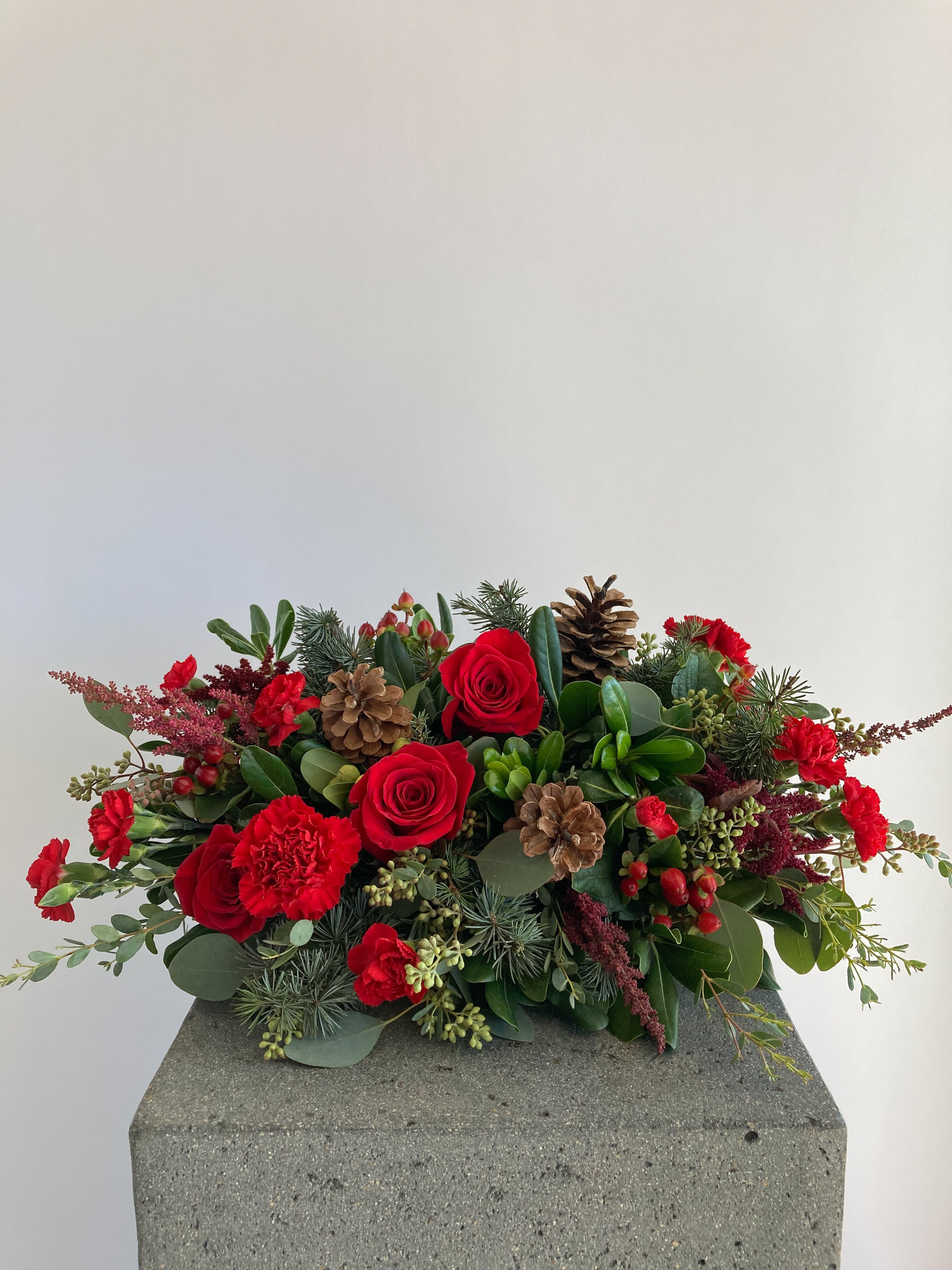 Home For The Holidays Centerpiece | Winter Seasonal Florist Design in Red Tones + Christmas Greens