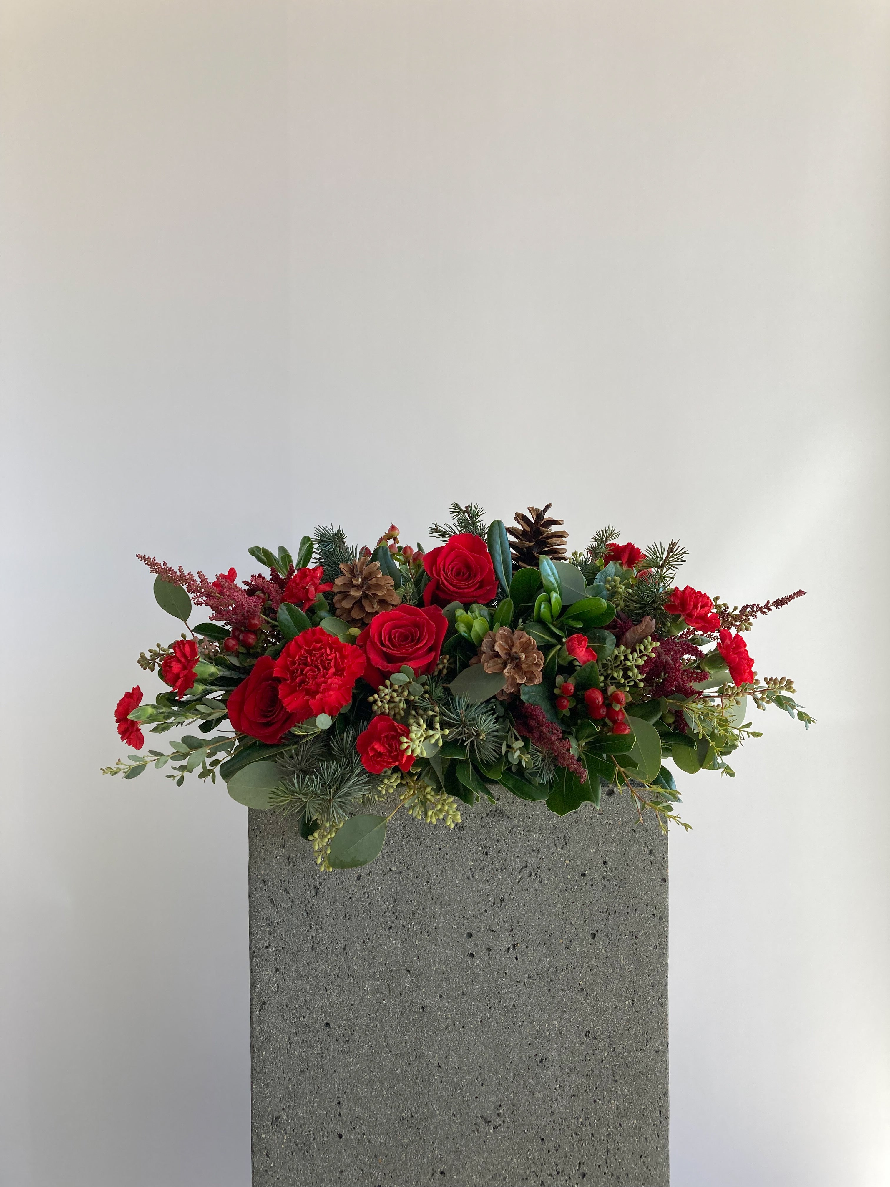 Home For The Holidays Centerpiece | Winter Seasonal Florist Design in Red Tones + Christmas Greens