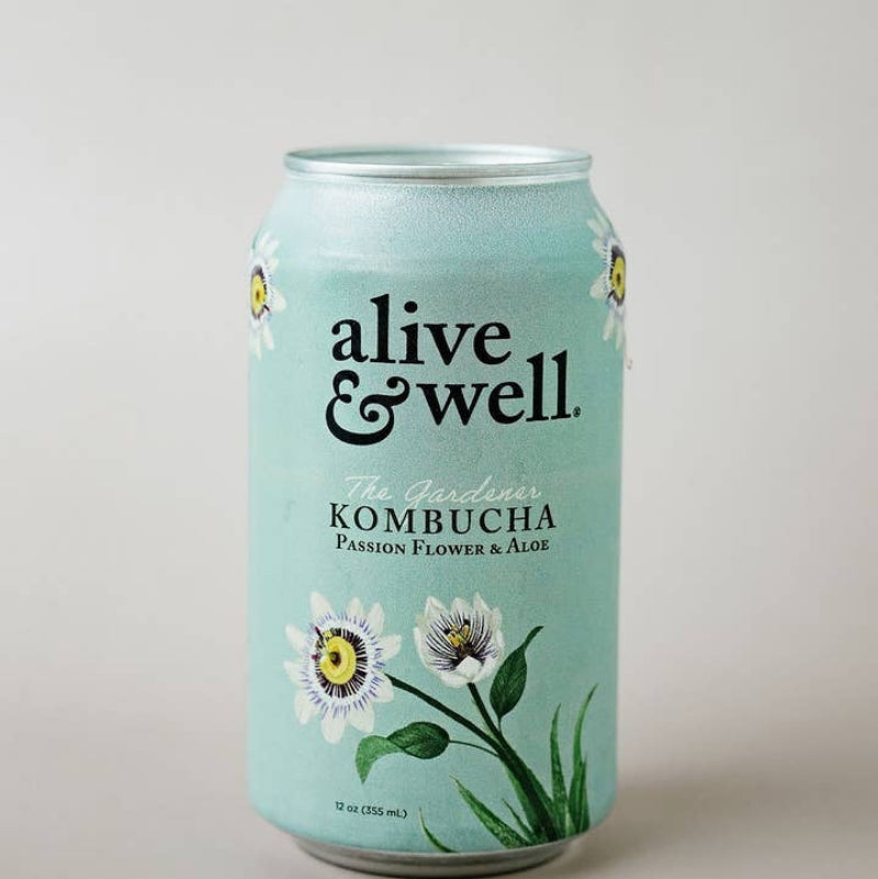 A 12 fl oz aluminum can of Alive & Well Kombucha Passion Flower and Aloe flavor, featuring a light mint green label with white and yellow flowers and green leaves, set against a plain light gray background.