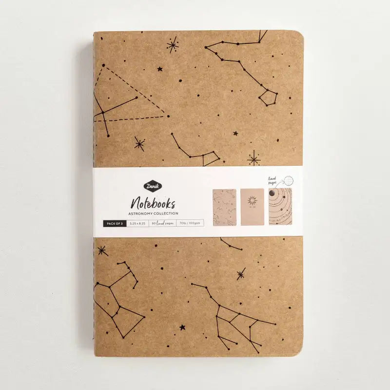 Kraft paper notebooks with star constellation design on a white background