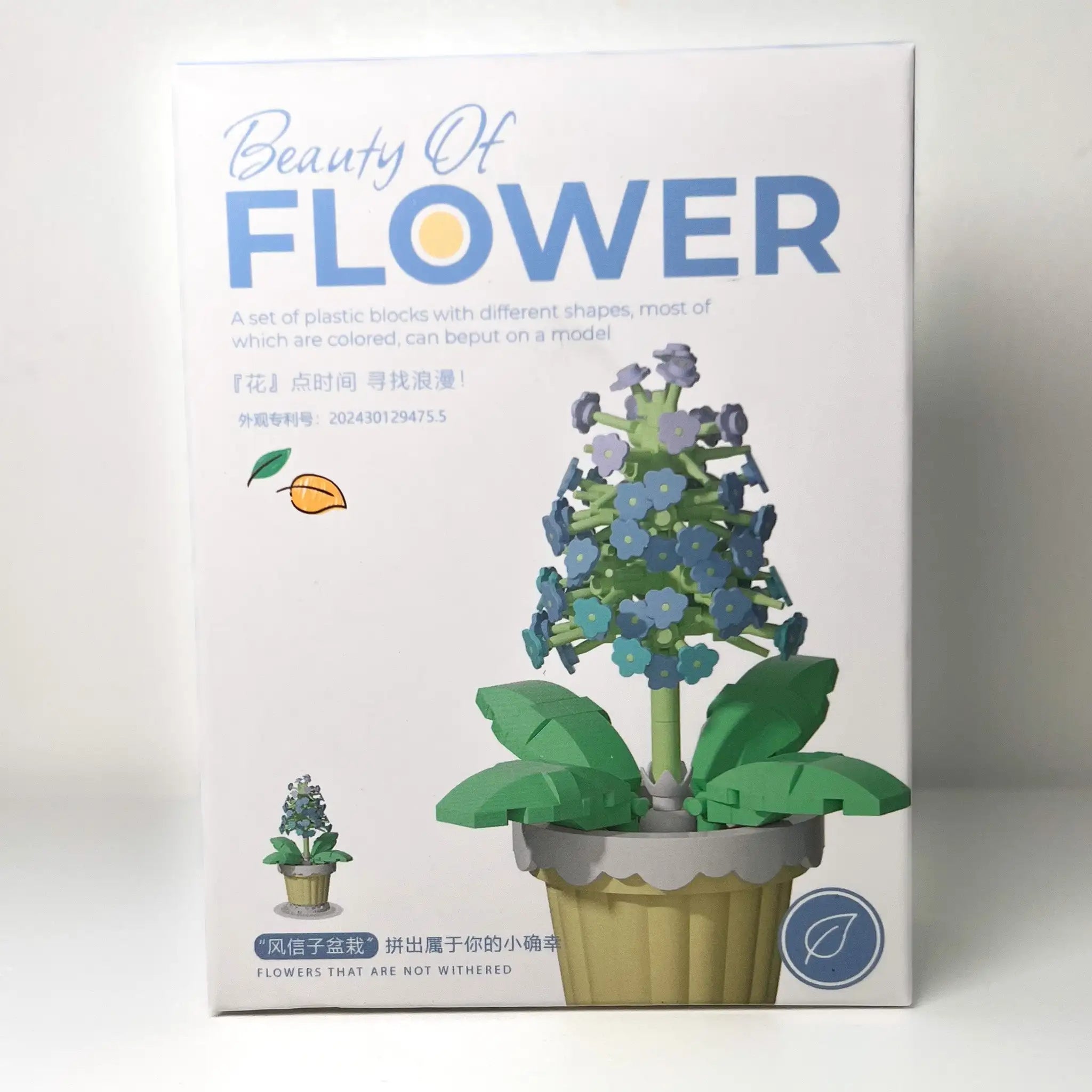 Box packaging of a flower model kit with 'Beauty of Flower' branding.