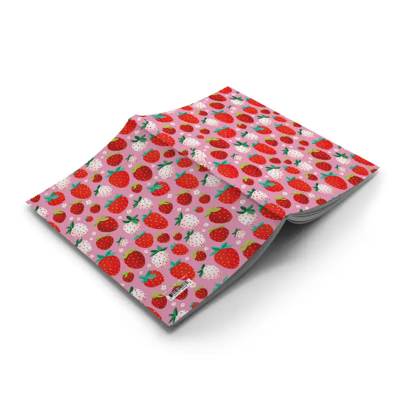 Notebook with strawberry pattern on a white background
