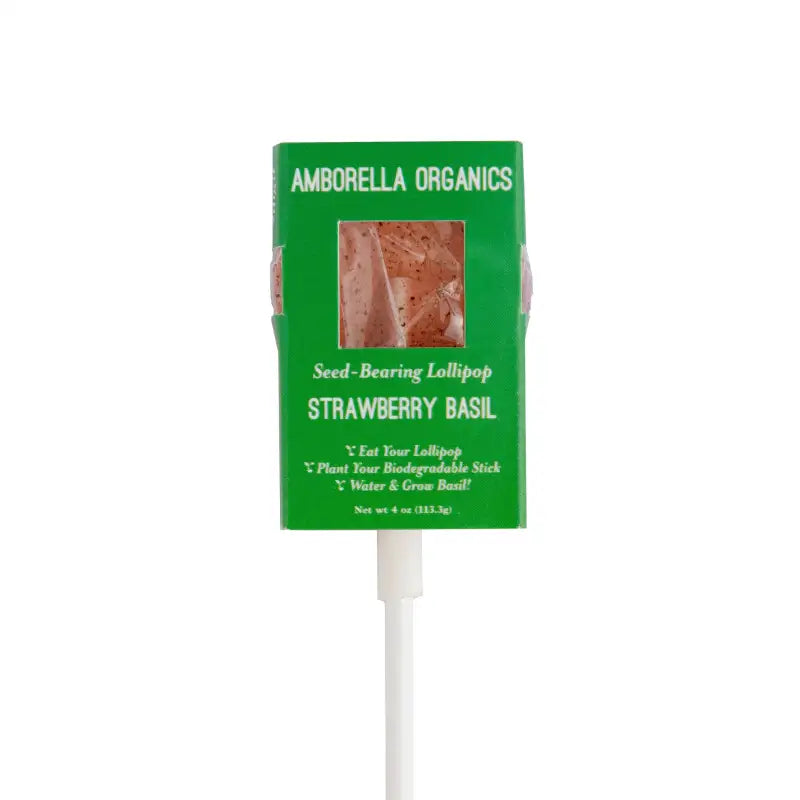 Strawberry Basil seed-bearing lollipop in green packaging on a white background