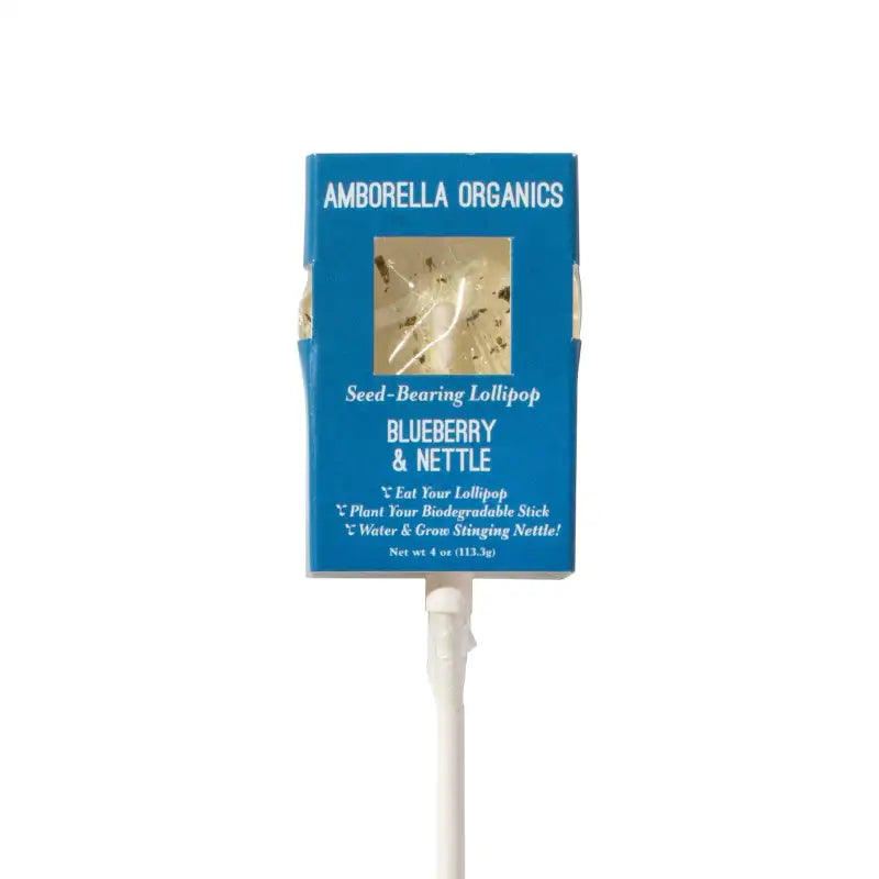 Amborella Organics seed-bearing lollipop packaging with blue label on a white background