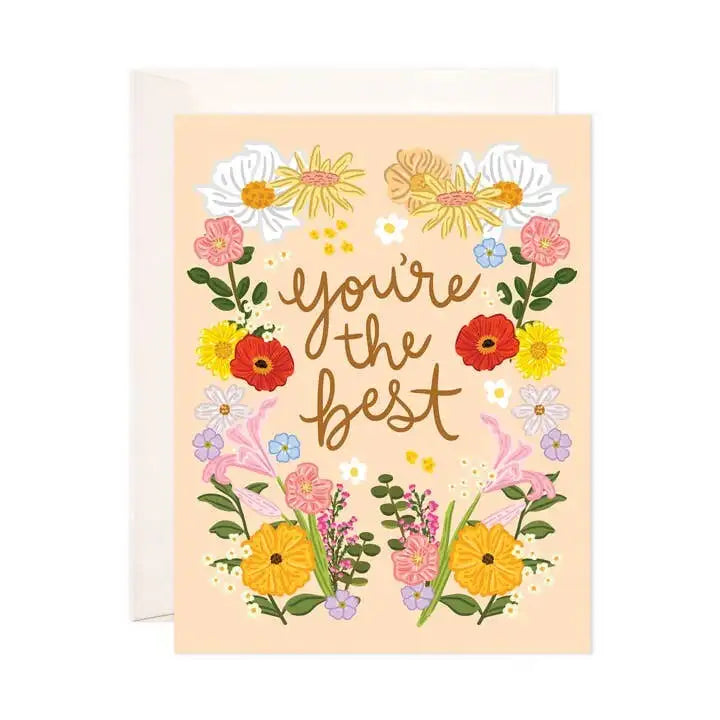 Greeting card with floral design and 'you're the best' text on a peach background