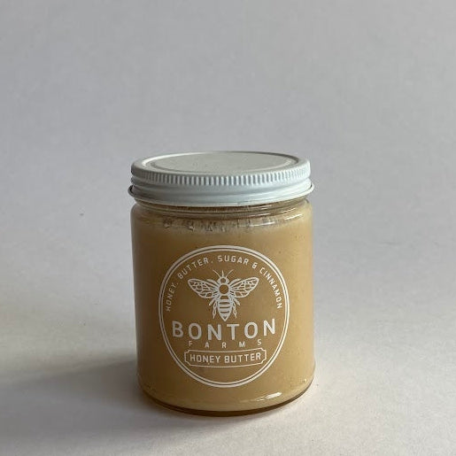 Jar of Bonton Honey Butter on a gray background