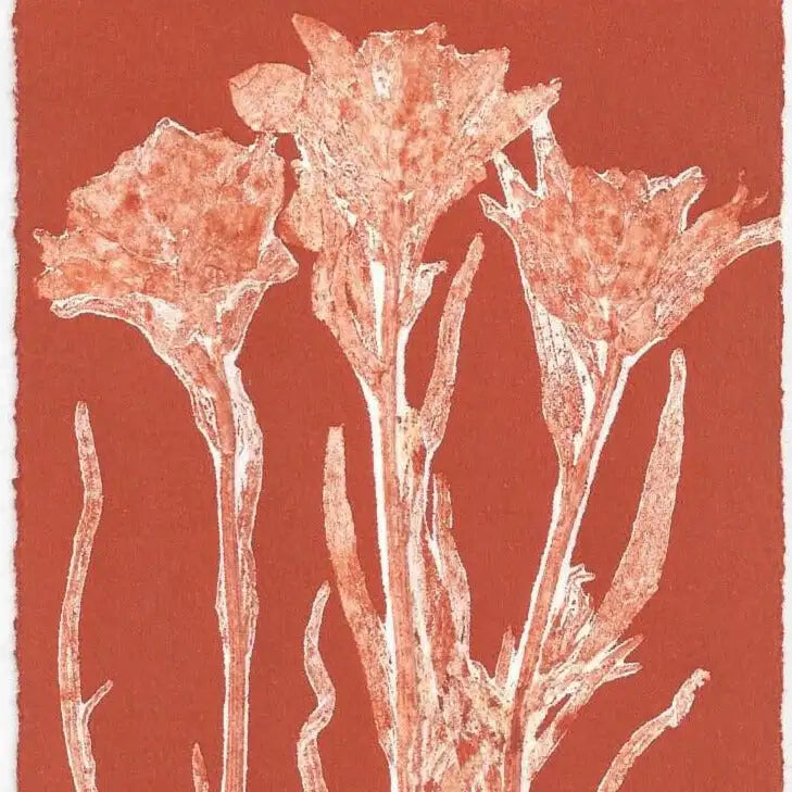 White floral silhouette on a orange background