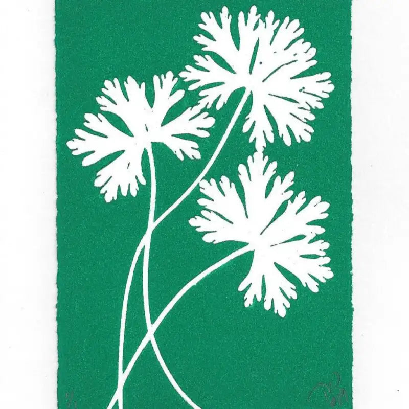 White floral silhouette on a green background