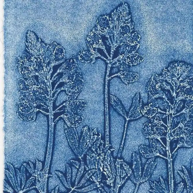 Blue floral pattern on a textured blue background