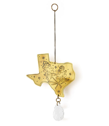 Decorative hanging ornament shaped like the state of Texas with floral design and teardrop glass suncatcher