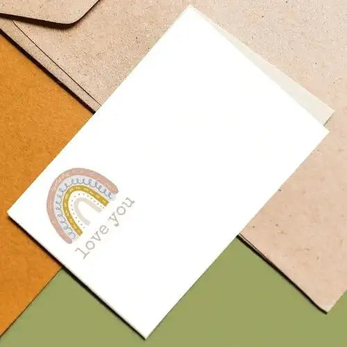 Card with rainbow design and 'love you' text on a colorful background