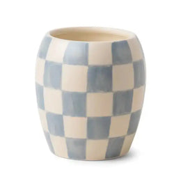 Ceramic cup with checkered pattern on a white background