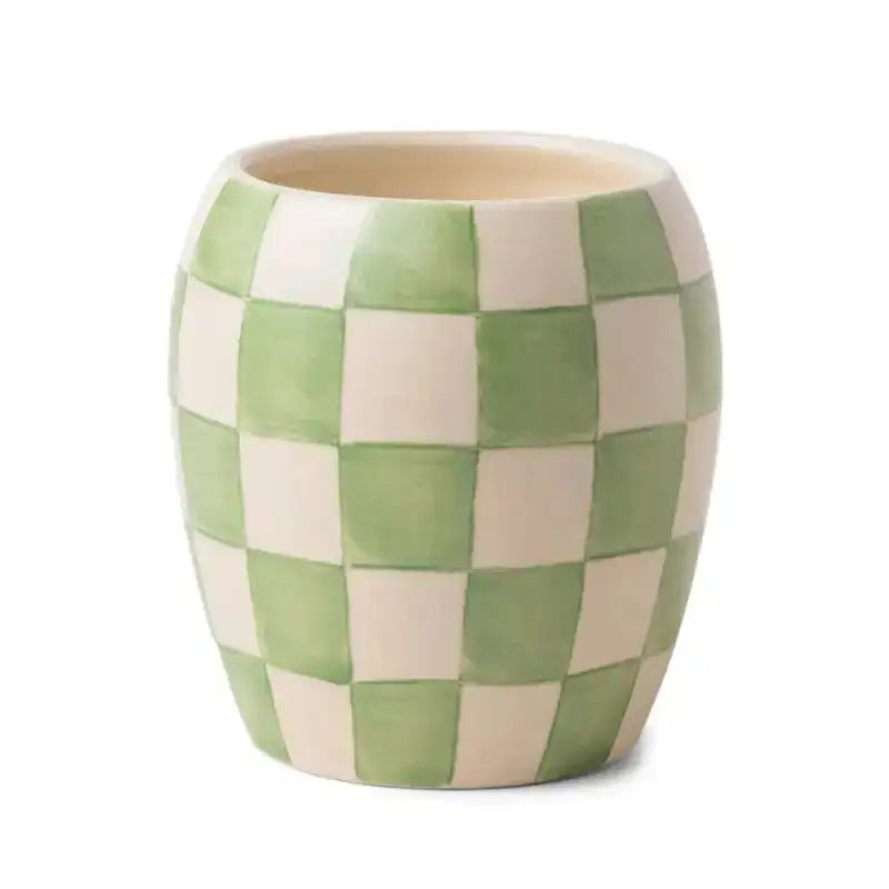Ceramic vase with green and beige checkered pattern on a white background