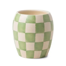 Ceramic vase with green and beige checkered pattern on a white background
