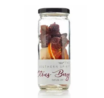 Glass jar with dried fruits and a label on a white background