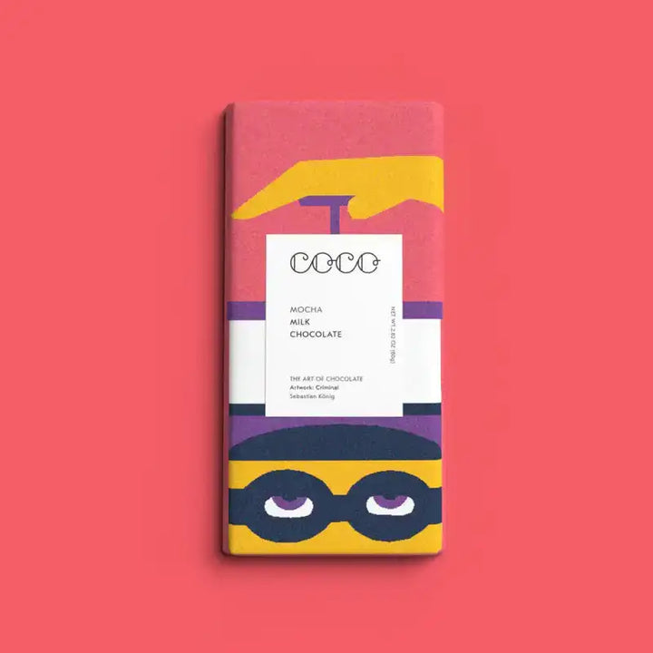 Chocolate bar packaging with a colorful design on a red background