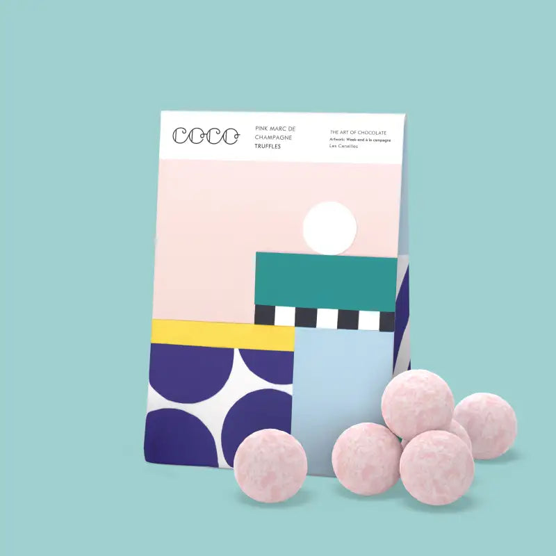 Colorful packaging of truffles on a light blue background