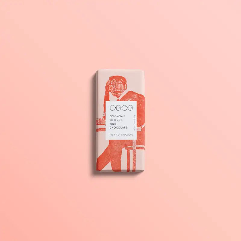 Chocolate bar packaging on a pink background