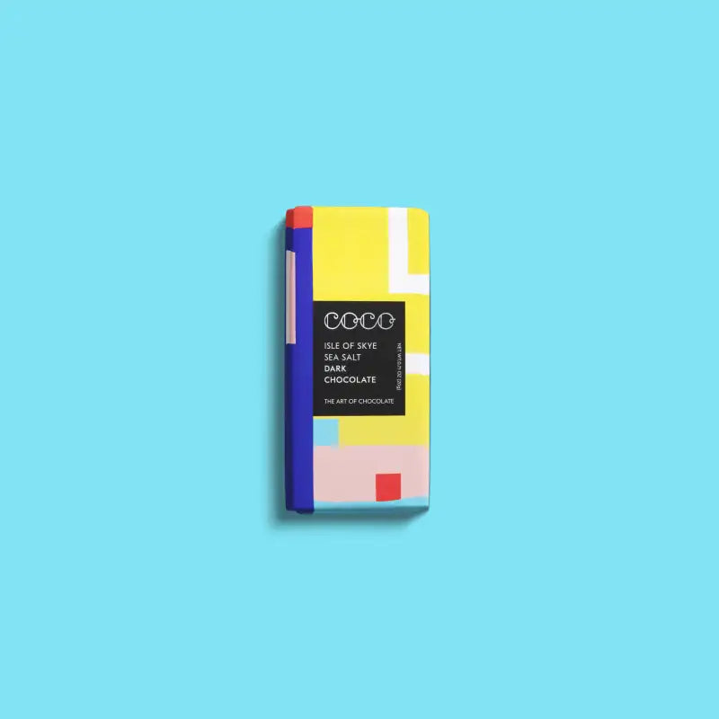 Colorful chocolate bar packaging with geometric design on a blue background