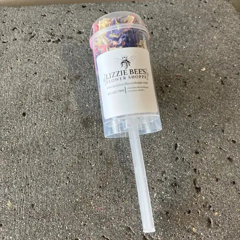 Lizzie Bee's Flower Shoppe product on a concrete surface