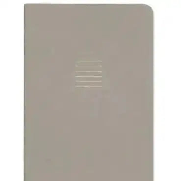 Plain beige notebook with a grid pattern on a white background