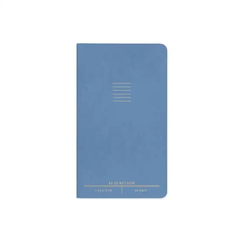 Blue notebook with grid pattern on a white background