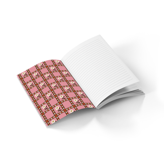 open lined journal with flower print on inside cover