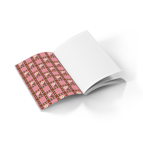open lined journal with flower print on inside cover