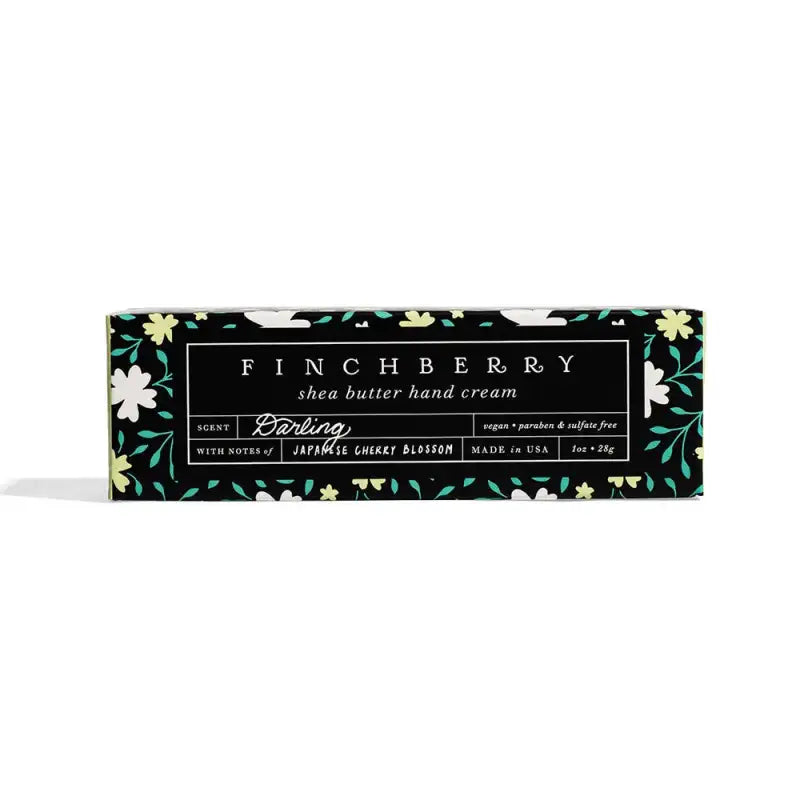 Finchberry shea butter hand cream packaging with floral design on a white background