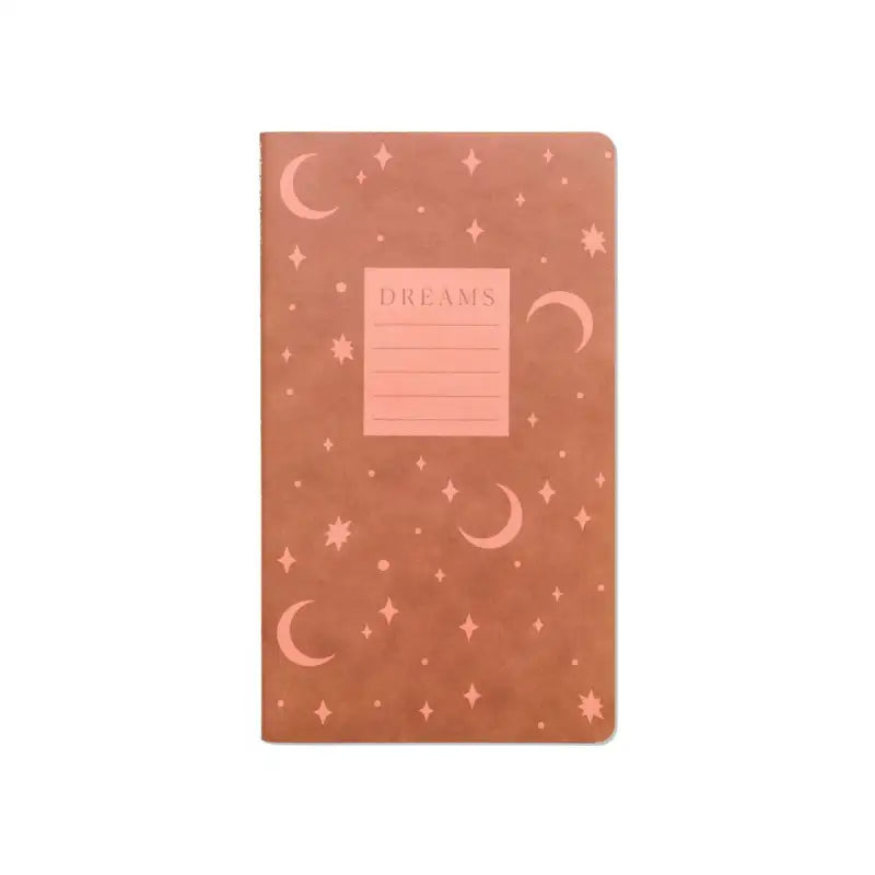 Notebook with celestial design and 'Dreams' section on a white background