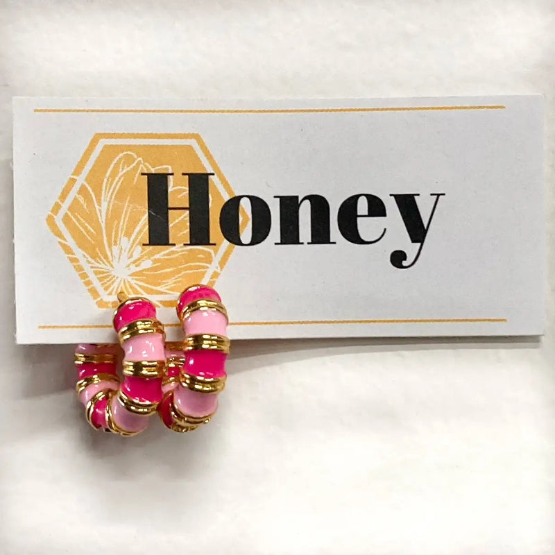 Pink and gold beaded earrings on a card with 'Honey' text