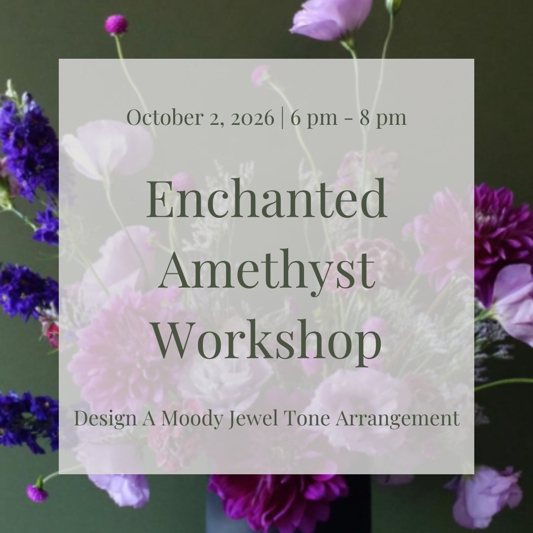 Moody floral arrangement featuring deep purple flowers, lavender blooms, and dark foliage created during the Enchanted Amethyst Floral Workshop at Lizzie Bee's Flower Shoppe in Richardson, Texas.
