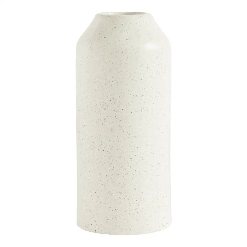 White ceramic vase with speckled texture on a white background
