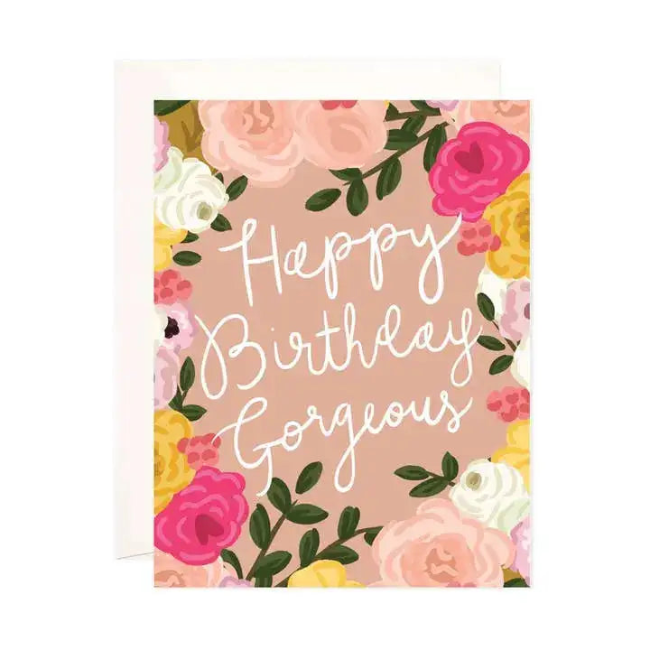 Greeting card with floral design and 'Happy Birthday Gorgeous' text on a beige background