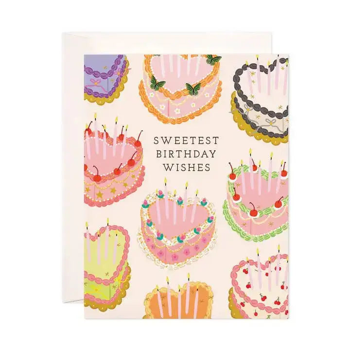 Greeting card with colorful birthday cake illustrations and 'Sweetest Birthday Wishes' text on a white background.