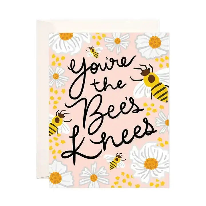 Card with 'You're the Bee's Knees' text surrounded by bees and flowers on a pink background