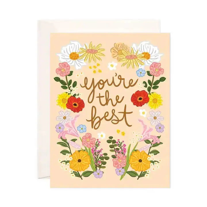 Greeting card with floral design and 'you're the best' text on a light pink background