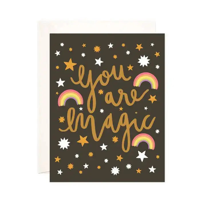 Card with 'You are magic' text and rainbow illustrations on a dark background