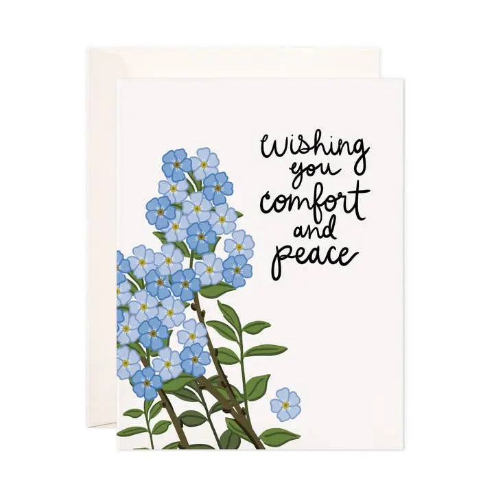 Greeting card with blue flowers and text 'Wishing you comfort and peace' on a white background