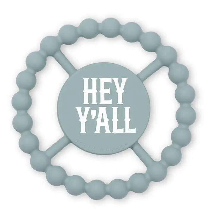 Teething ring with 'HEY Y'ALL' text on a white background