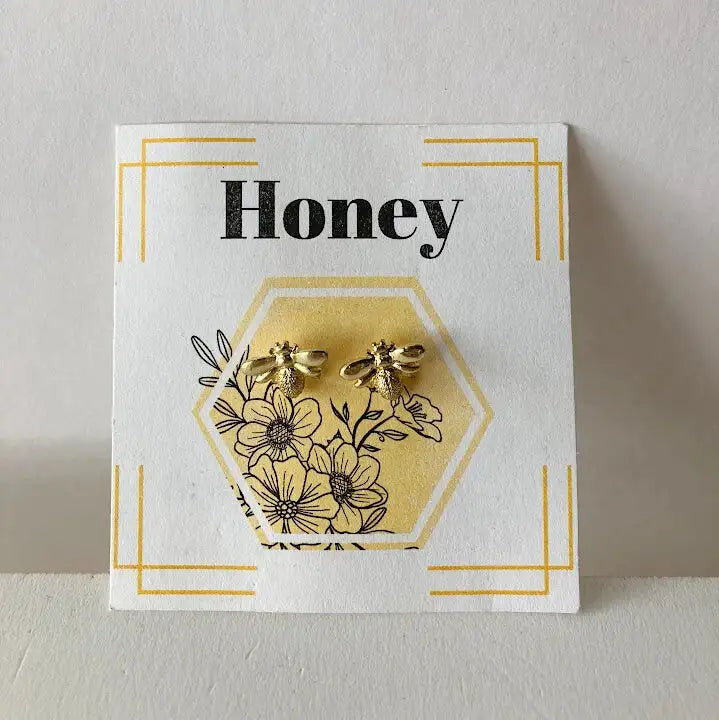 Bees and flowers earrings on a 'Honey' branded card with floral design