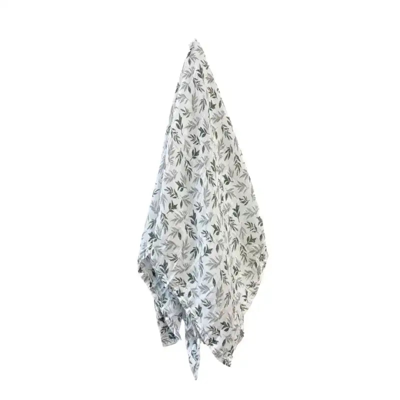 Floral patterned fabric draped over a white background