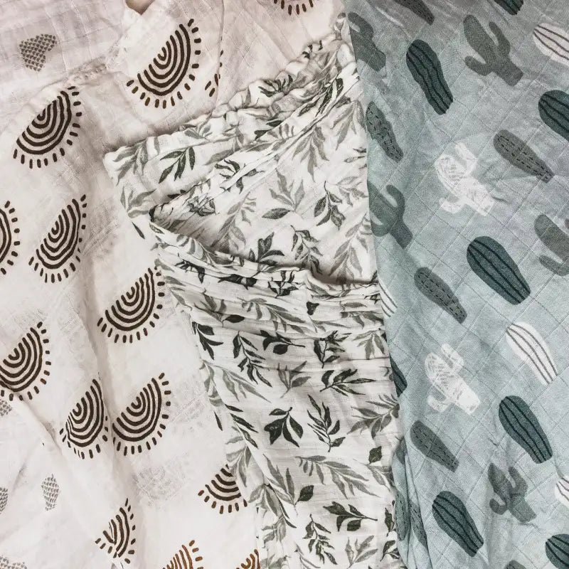 Three patterned fabrics with different designs on a neutral background