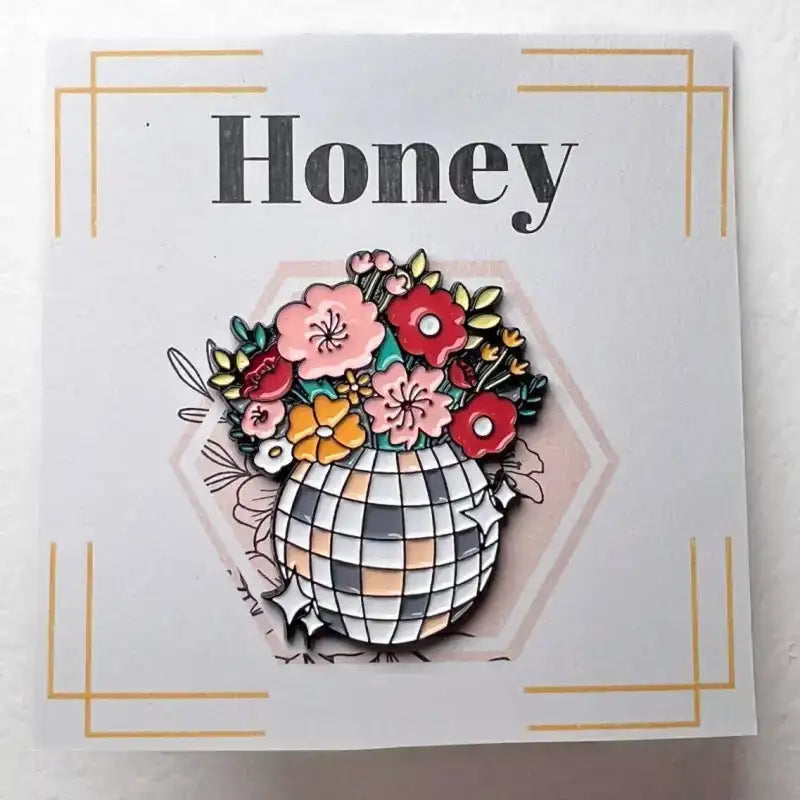 Decorative card with floral design and 'Honey' text on a white background
