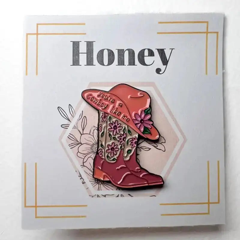 Pink cowboy boot and hat pin on a card with 'Honey' text