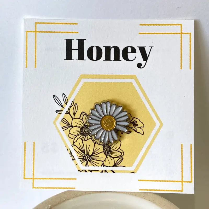 Decorative card with floral design and 'Honey' text on a white background